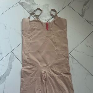 SPANX Nude Shapewear Slip.
SPANXshape™ Invisible Mid-Thigh Bodysuit